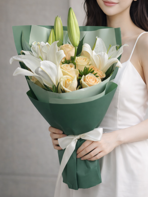 Tabitha – Lilies with Champagne Roses [B22]